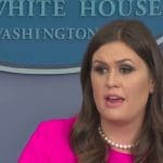 Watch Sarah Sanders desperately lash out at reporters for asking about “moron” Trump