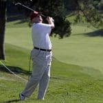 Mnuchin claims Trump worked on virus relief from golf course
