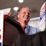 Americans raise millions for Doug Jones as third poll shows him beating Roy Moore