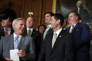 House Majority Leader Kevin McCarthy of Calif., and House Speaker Paul Ryan of Wis., laugh during a statement by House Republicans to the media following a vote