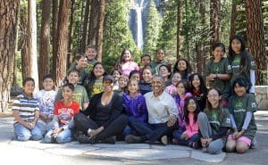 President Barack Obama and Michelle Obama pose with fourth graders near Lower Yosemite Falls after talking to them about the Every Kid in a Park Program in Yosemite National Park, Saturday, June 18, 2016.