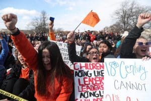Students march to the Capitol Building to call on Congress for action