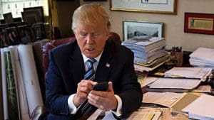 Donald Trump on his phone