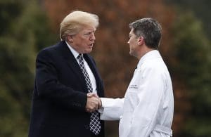 Donald Trump shakes hands with White House physician Dr. Ronny Jackson