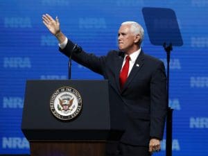 Mike Pence waves after speaking at the National Rifle Association Leadership Forum