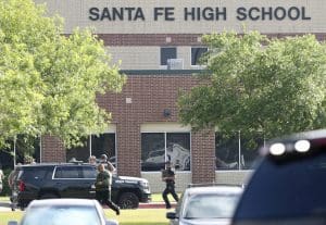 Emergency responders respond to an active shooter in front of Santa Fe High School Friday, May 18, 2018, in Santa Fe.