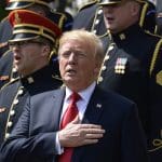 Watch Trump stumble through national anthem he doesn’t know words to