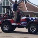 GOP candidate shocks Kansas town with machine gun parade float