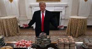 Donald Trump with a table full of fast food