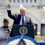 Trump uses police officer memorial service to promote his wall