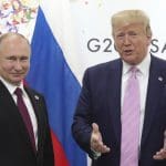 Trump laughs with Putin about meddling in US elections after saying he’d welcome it