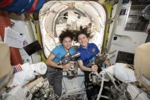 U.S. astronauts Jessica Meir, left, and Christina Koch
