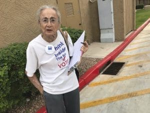Woman collecting signatures for a ballot measure