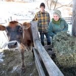 Wisconsin governor helps dairy farmers hurt by Trump
