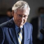 McConnell refuses $2,000 virus relief checks unless Democrats OK voter suppression