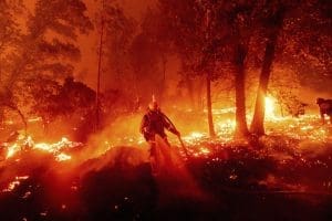 Firefighter and flames in California
