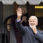 Hours before polls close, Biden calls for unity — and Trump stokes divisions