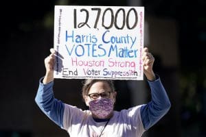 Demonstrator against voter suppression in Houston