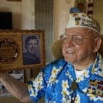 Survivors of Pearl Harbor observe the anniversary at home this year
