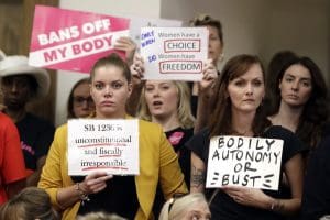 Women at abortion ban hearing