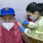 Latinos in US still face too many barriers to getting vaccine