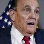 Voting company sues Rudy Giuliani and Fox News for $2.7 billion over fraud lies