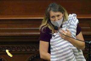 California Assemblywoman Buffy Wicks at session with baby
