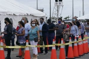 People wait in line for vaccine