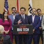 DeSantis gives shoutout to far-right activist as he signs bill to punish Twitter