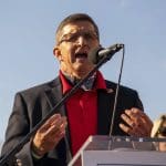 Michael Flynn forgets words to Pledge of Allegiance during rally for pro-Trump lawyer