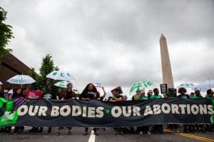 Our Bodies Our Abortions banner at Washington protest
