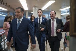 From left, Sen. Ted Cruz, R-Texas, Sen. Josh Hawley, R-Mo., and Sen. Mike Lee, R-Utah, arrive as senators go to the chamber for votes ahead of the approaching Memorial Day recess, at the Capitol in Washington, May 27, 2021.