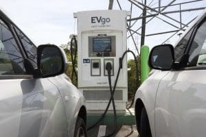 Electric cars are parked at a charging station in Sacramento, Calif., on April 13, 2022.