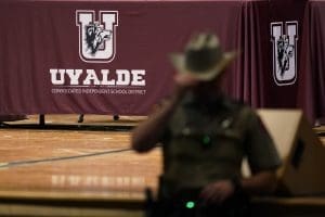 A Texas Department of Safety Trooper stands by at a meeting of the meeting of the Board of Trustees for the Uvalde Consolidated Independent School District on Aug. 24, 2022.