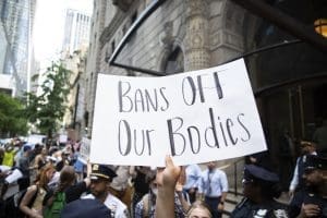 Abortion rights activists rally in front of the Federalist Society