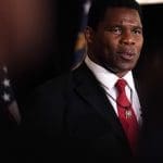 Herschel Walker in paid partnership with marketing company accused of preying on veterans