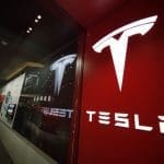 Labor board rules Tesla must let workers wear union clothing