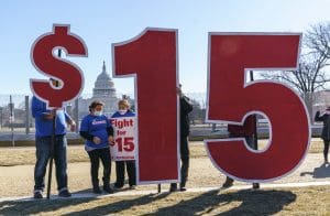 Activists appealing for a $15 minimum wage near the Capitol in Washington on Thursday, Feb. 25, 2021.