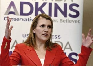 Amanda Adkins, the Republican nominee for the Kansas 3rd District congressional race, speaks Monday, Sept. 26, 2022, during a news conference in Shawnee, Kan. (Rich Sugg/The Kansas City Star via AP)