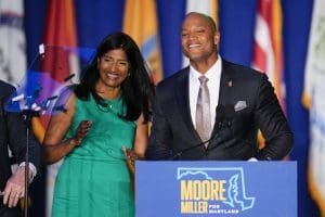 Aruna Miller (left) and Wes Moore (right) on stage during an election night gathering after Miller was declared the winner in the race for the Maryland lieutenant governor and Moore was declared the winner in the gubernatorial race on Tuesday, Nov. 8, 2022, in Baltimore.