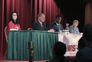 From left, Wisconsin state Supreme Court candidates Jennifer Dorow, Dan Kelly, Everett Mitchell, and Janet Protasiewicz participate in a candidate forum at Monona Terrace in Madison on Jan. 9, 2023.