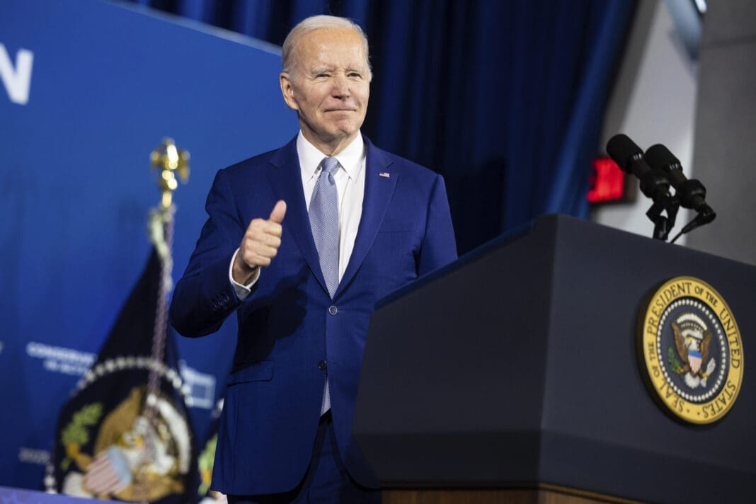 President Joe Biden gestures as he departs after delivering remarks at the White House Conservation in Action Summit at Department of Interior headquarters in Washington, D.C., March 21, 2023.