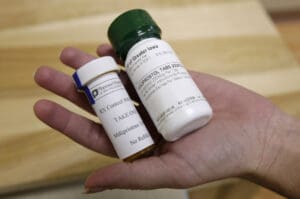 Bottles of abortion pills mifepristone, left, and misoprostol, right, at a clinic in Des Moines, Iowa, Sept. 22, 2010.