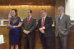 From left, North Carolina Rep. Tricia Cotham, Sen. Michael Lazzara, House Speaker Tim Moore, and Senate leader Phil Berger listen during a Legislative Building news conference in Raleigh, N.C., on Wednesday, April 26, 2023.