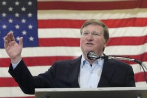 Mississippi Republican Gov. Tate Reeves outlines his successes in office to supporters at a campaign rally in Richland, Miss., on May 3, 2023.