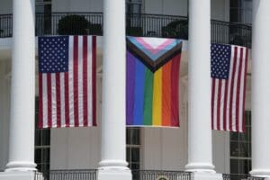 American flags and pride flag at the White House