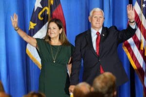 Republican presidential candidate former Vice President Mike Pence waves on stage with his wife Karen after he spoke during the North Carolina Republican Party Convention in Greensboro, N.C., June 10, 2023.